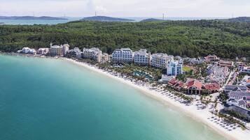 Private beach, white sand, sun loungers, beach umbrellas