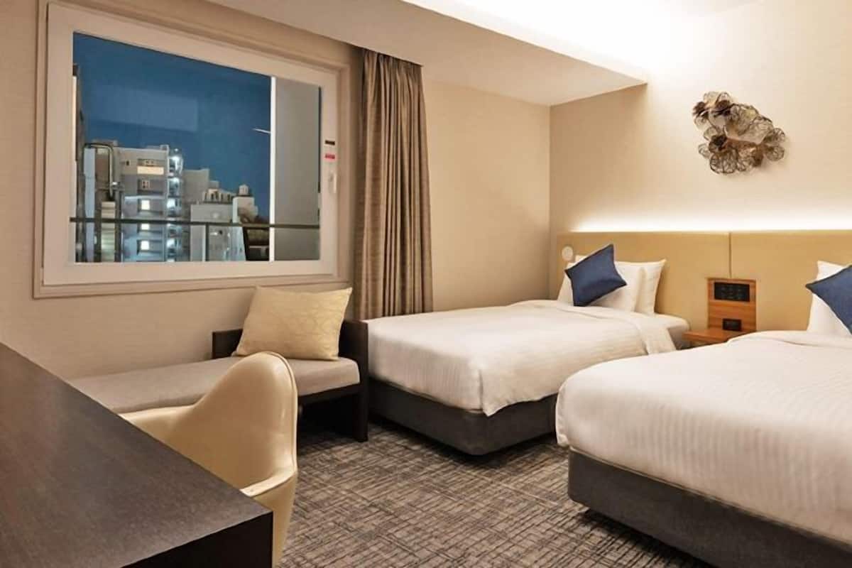 Premium bedding, down duvets, pillow-top beds, in-room safe