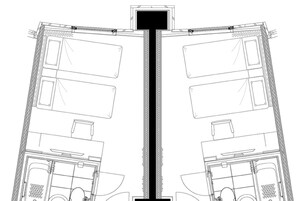A symmetrical floor plan of a hotel room with a central corridor, two bathrooms, a kitchenette, and a bed.