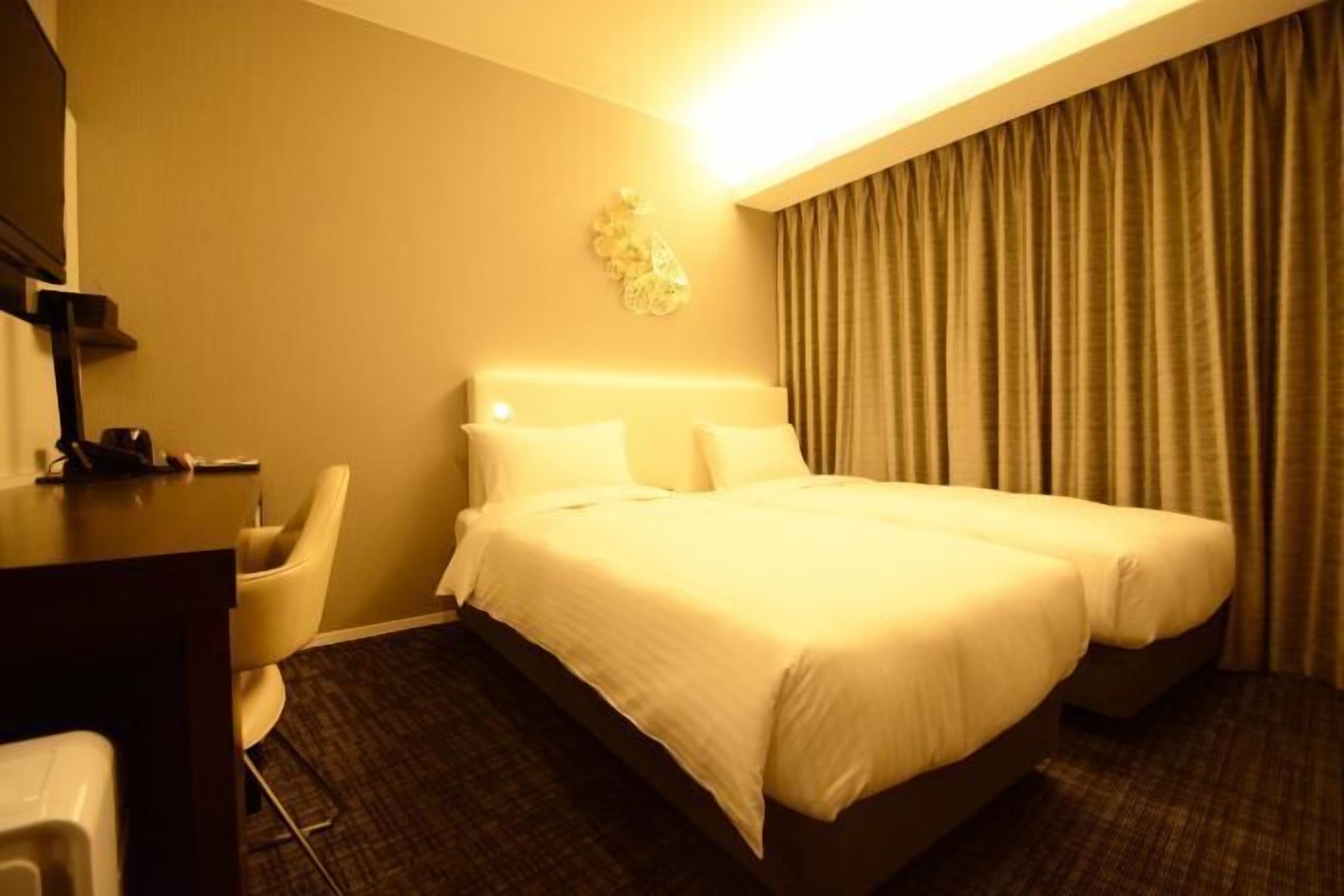 Premium bedding, down comforters, pillowtop beds, in-room safe