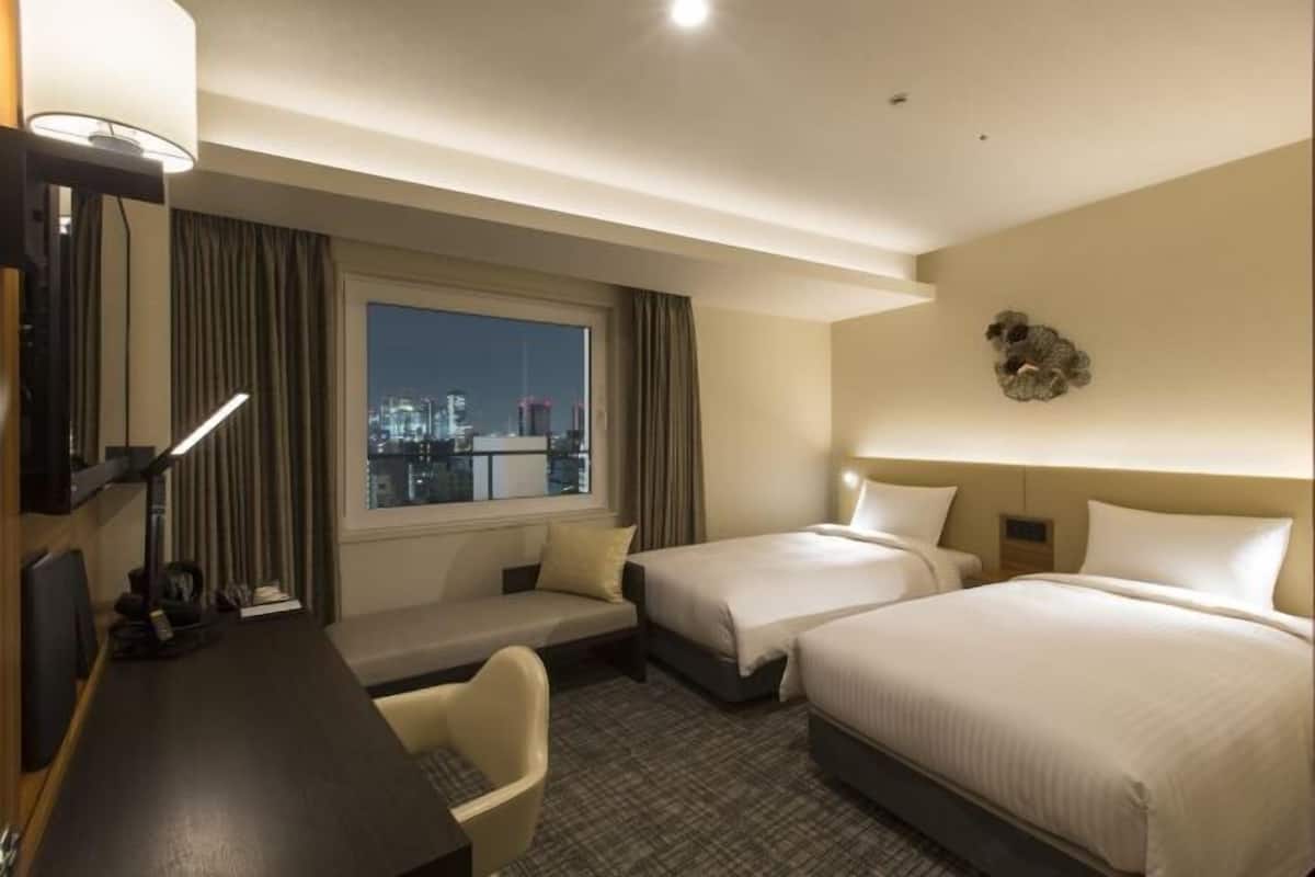 Premium bedding, down duvets, pillow-top beds, in-room safe
