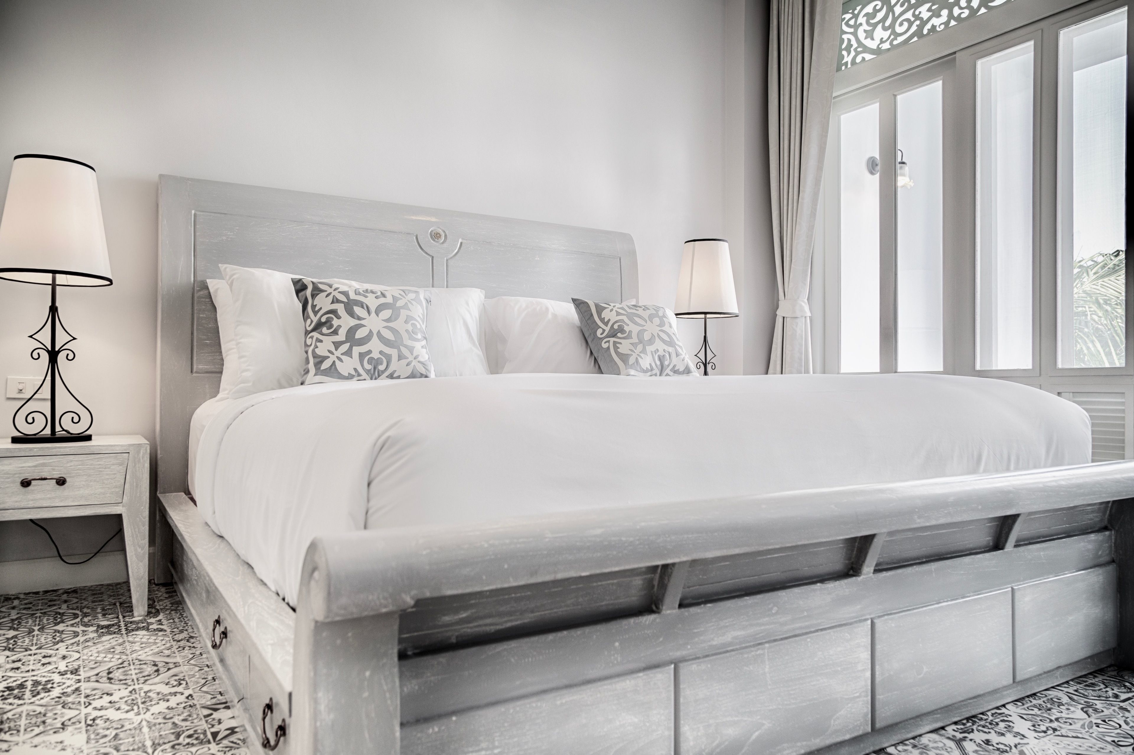 deluxe double bed with balcony pool view | free minibar, in-room safe, laptop workspace, iron/ironing board