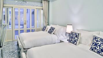 Deluxe Queen Twin Bed Pool View | Free minibar, in-room safe, laptop workspace, iron/ironing board