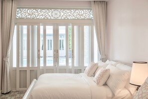 Deluxe Queen Twin Bed Pool View | Free minibar, in-room safe, laptop workspace, iron/ironing board - Noursabah Pattaya (Pattaya)
