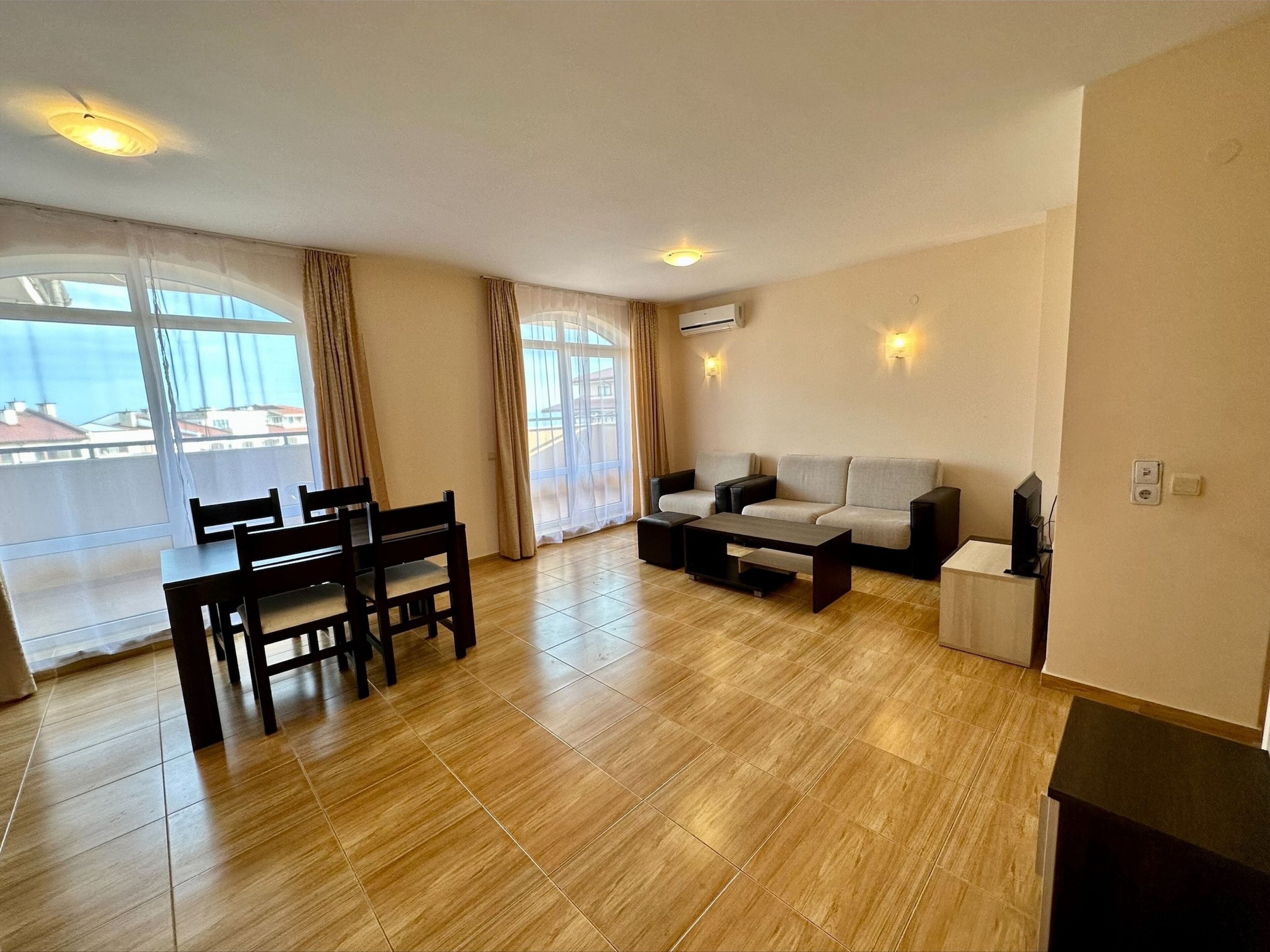 Comfort Apartment, Partial Sea View | Living room | TV