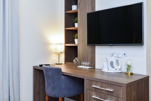 Double or Twin Room | Living area | Flat-screen TV