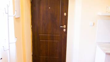 City Apartment, 1 Bedroom, Kitchen | 1 bedroom, desk, iron/ironing board, cribs/infant beds