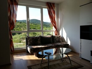 Estúdio | Sala de estar | TV