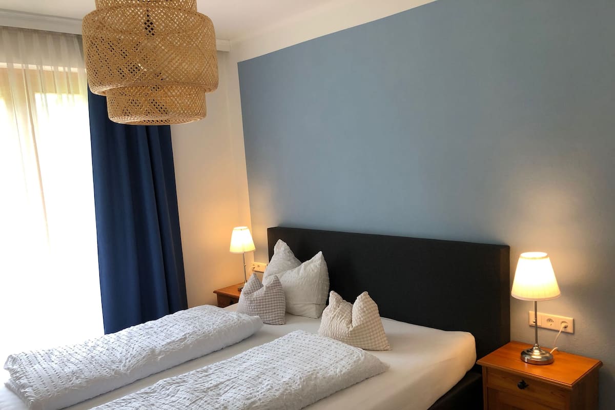 Family Suite, 2 Bedrooms, Balcony, Mountain View | 1 bedroom, free WiFi, bed sheets