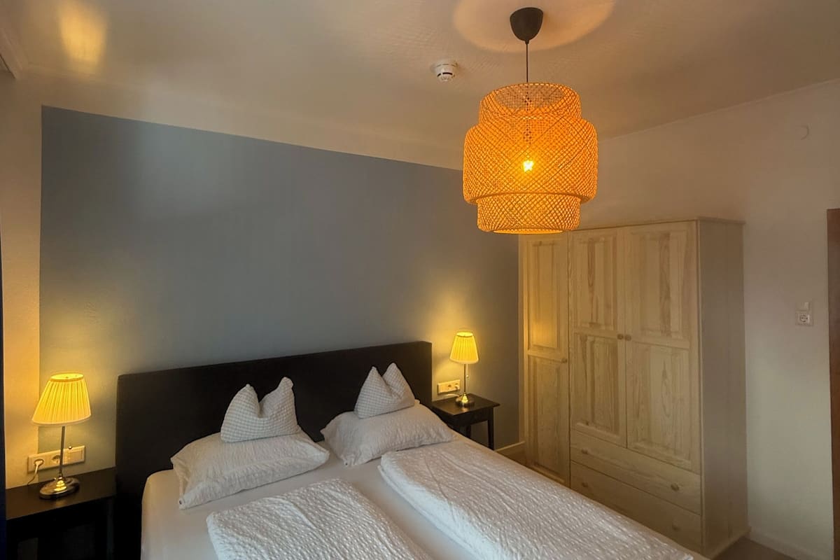 Family Suite, 2 Bedrooms, Balcony, Mountain View | Free WiFi, bed sheets