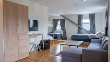 Familiekamer | Een bureau, verduisterende gordijnen, gratis wifi, beddengoed