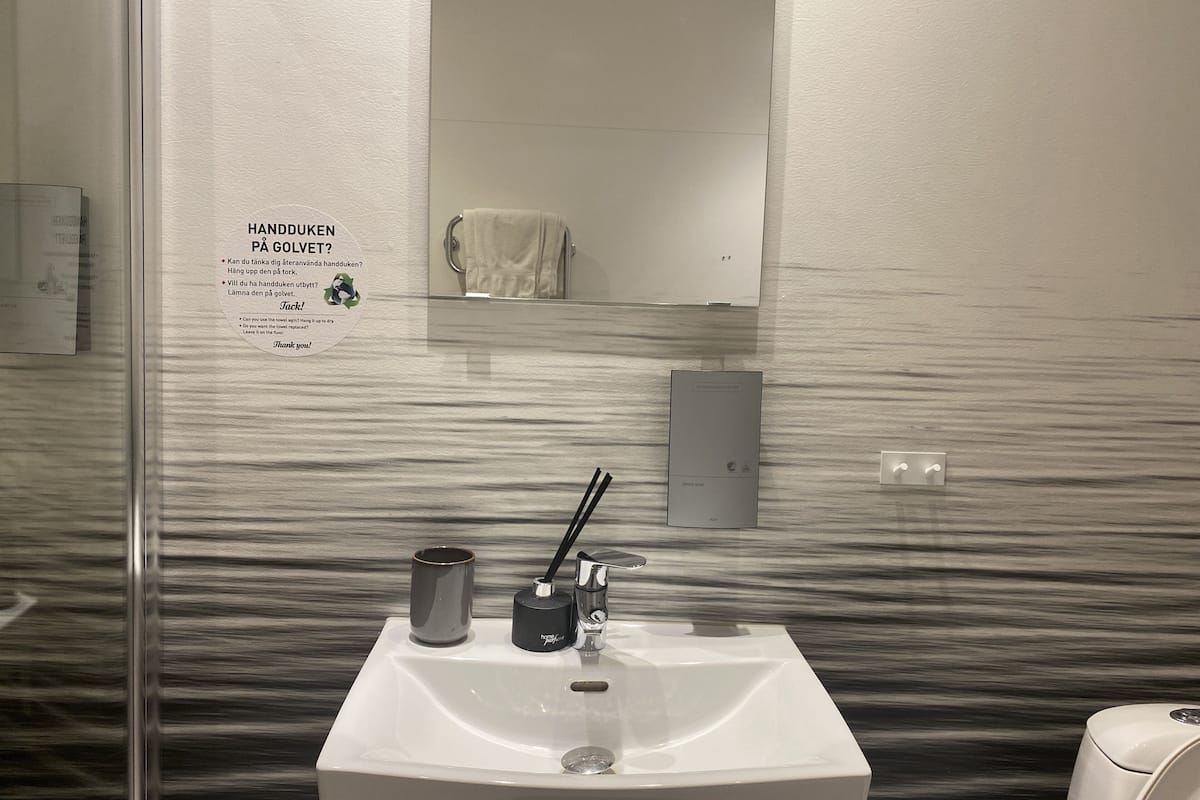 family room | bathroom | shower, rainfall showerhead, free toiletries, hair dryer