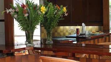 Breakfast, lunch served; local and international cuisine, pool views