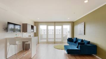 Xtra Luxury Apartment | Wohnbereich | Fernseher