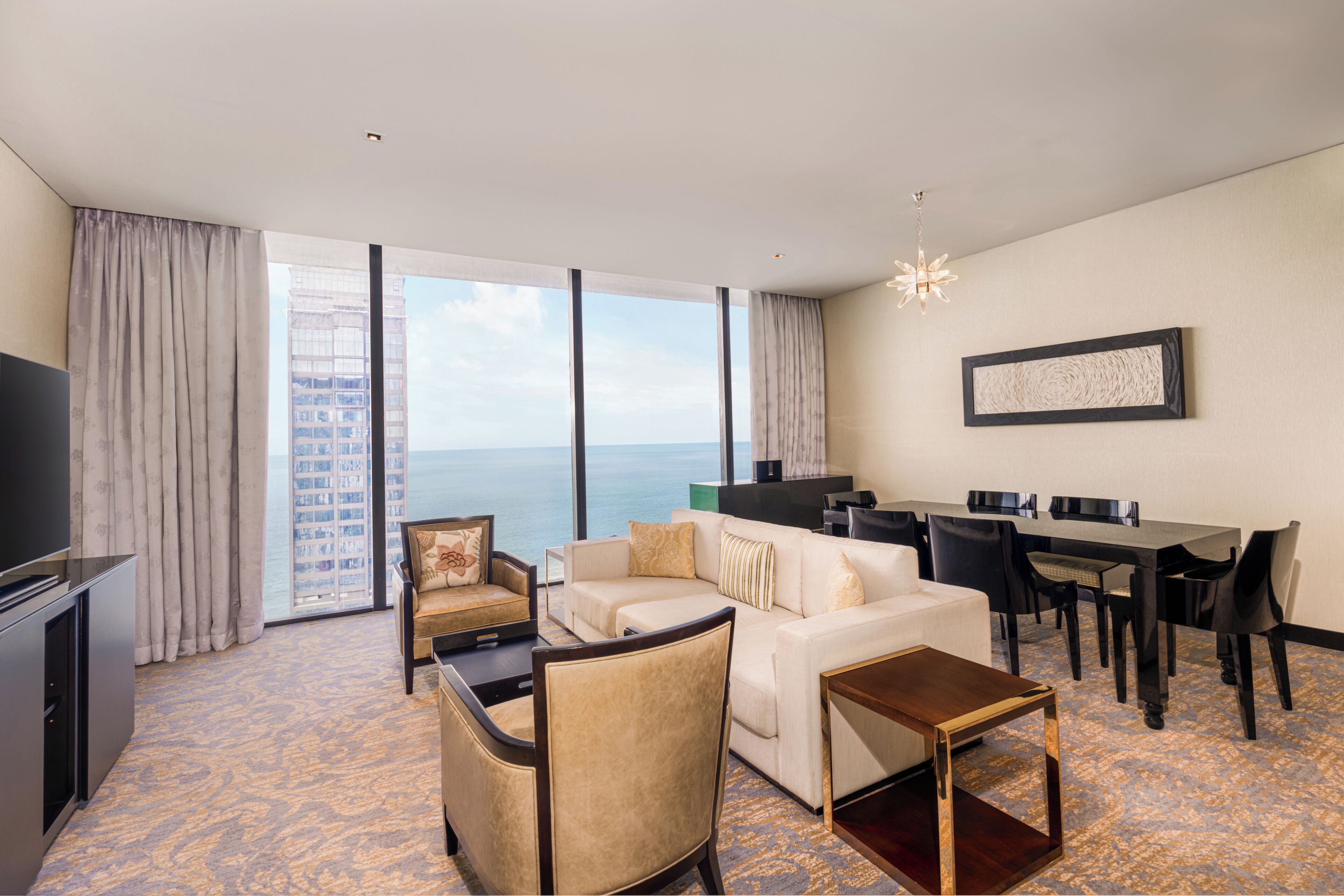Executive Suite, 1 King Bed, Ocean View | Living area | 48-inch LED TV with satellite channels, TV