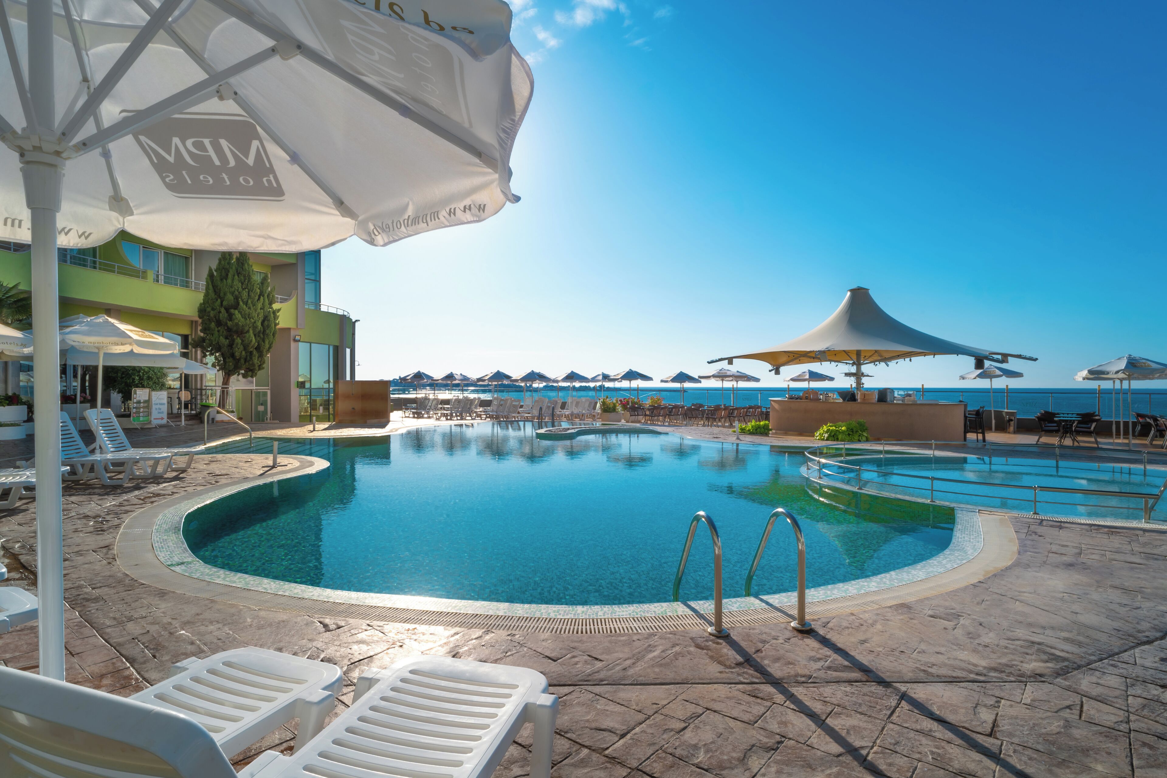 indoor pool, seasonal outdoor pool, pool umbrellas, pool loungers