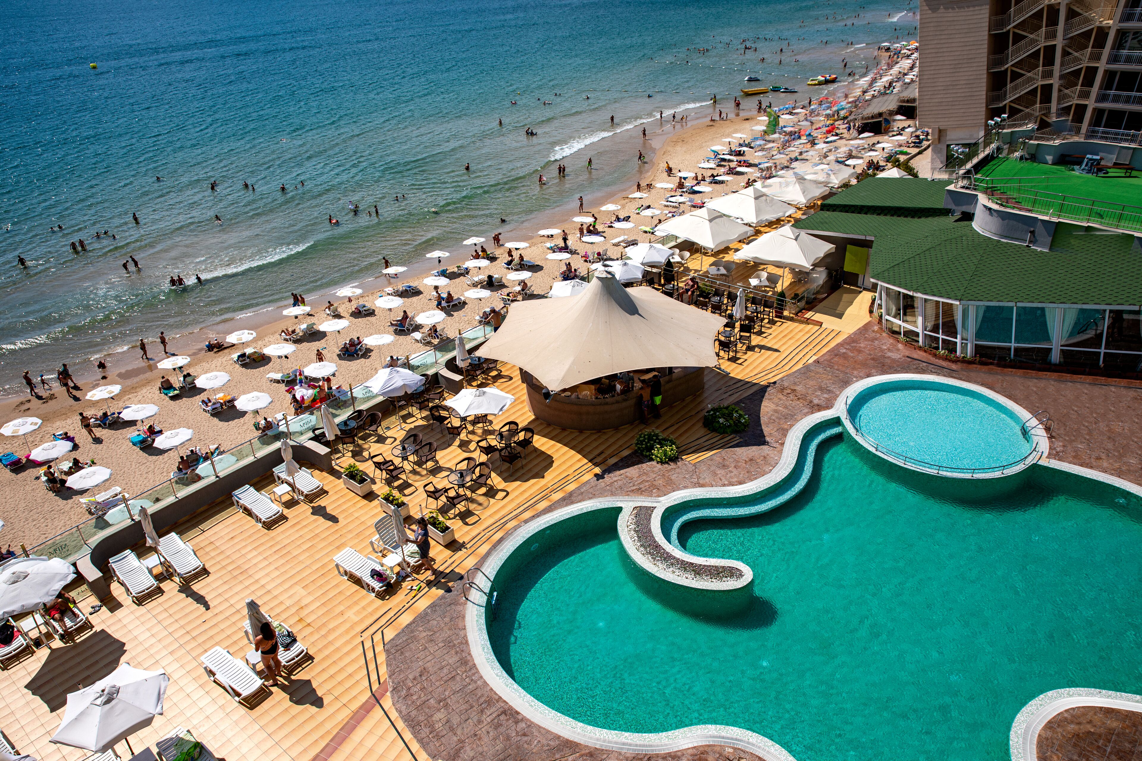 Indoor pool, seasonal outdoor pool, pool umbrellas, pool loungers