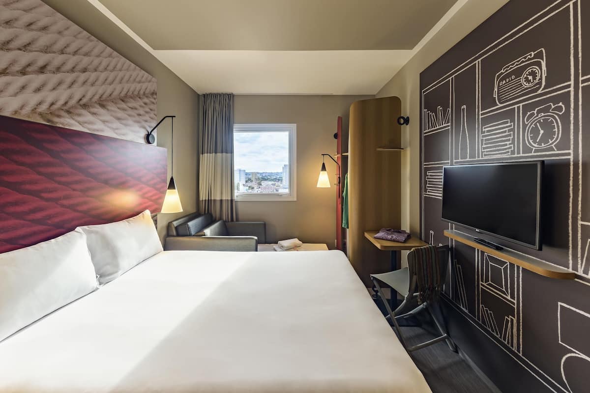 Standard Room, Multiple Beds | Minibar, in-room safe, desk, blackout curtains