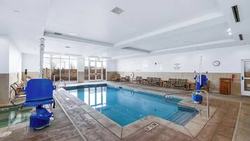Indoor pool, open 7 AM to 11 PM, pool loungers