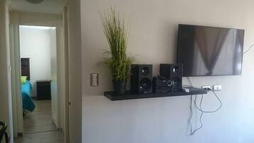 Apartment, 3 Bedrooms, 2 Bathrooms | Living area | Flat-screen TV