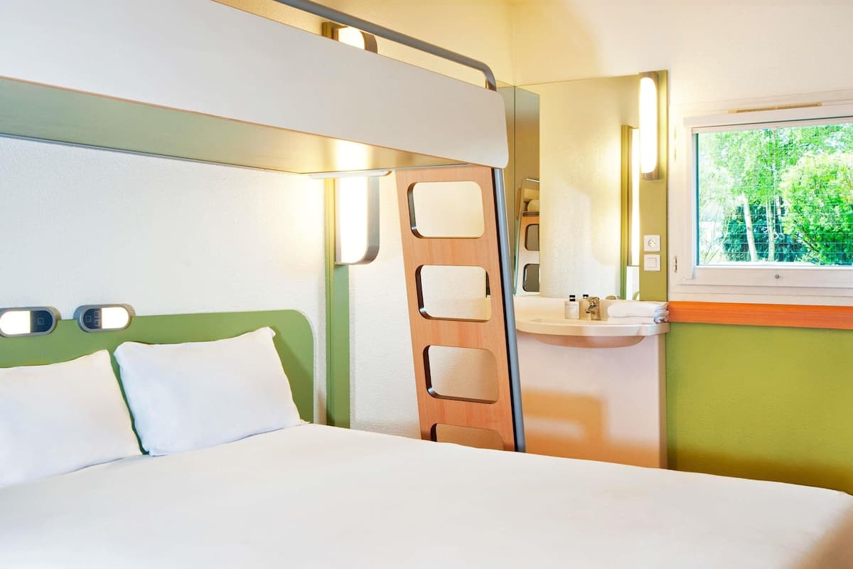 triple room, multiple beds | desk, blackout curtains, soundproofing, iron/ironing board