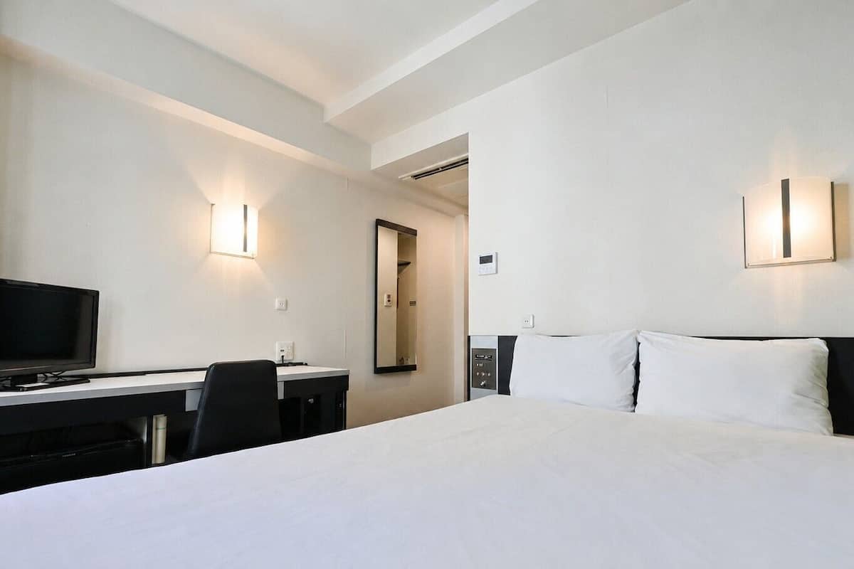 Desk, blackout drapes, iron/ironing board (on request), WiFi (free)