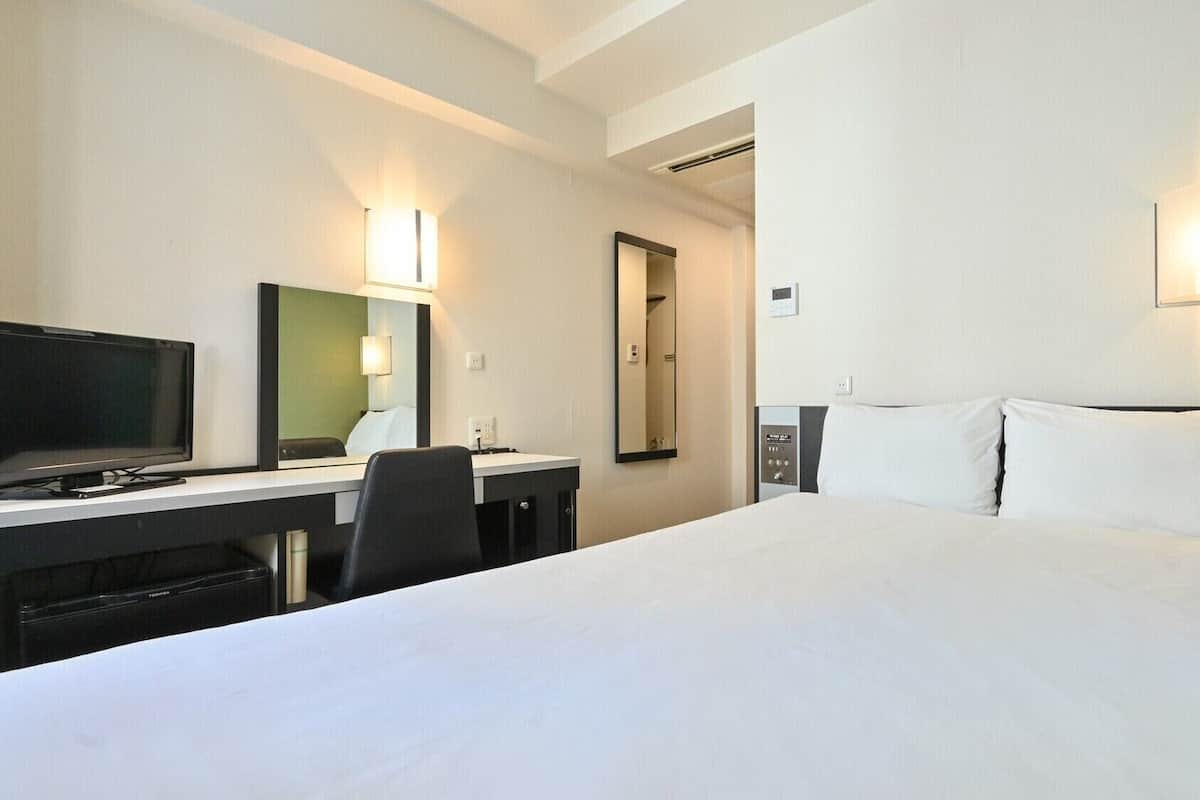 Desk, blackout drapes, iron/ironing board (on request), WiFi (free)
