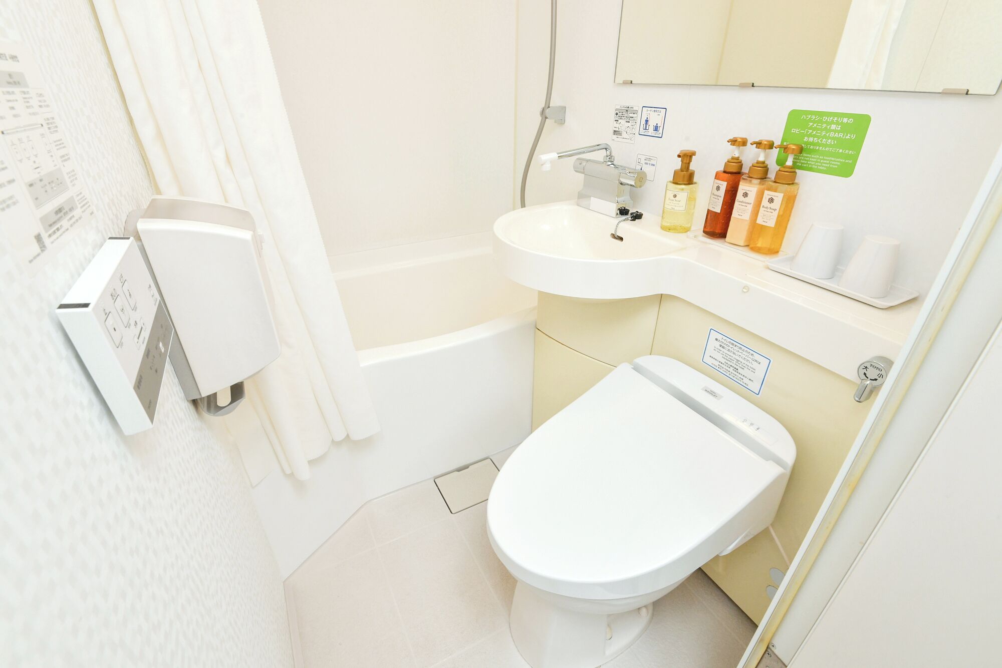 combined shower/bathtub, free toiletries, hair dryer, slippers