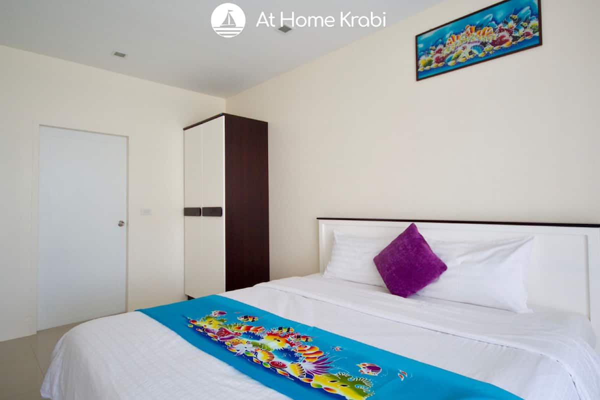 Apartamento família | Cofres nos quartos, Wi-Fi de cortesia, roupa de cama