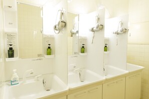 Shower, free toiletries, hair dryer, slippers