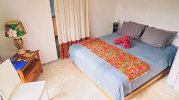 Habitación doble Confort, baño en la habitación, vista al jardín (Apetahi) | Camas con efecto memoria, decoración personalizada y cortinas blackout