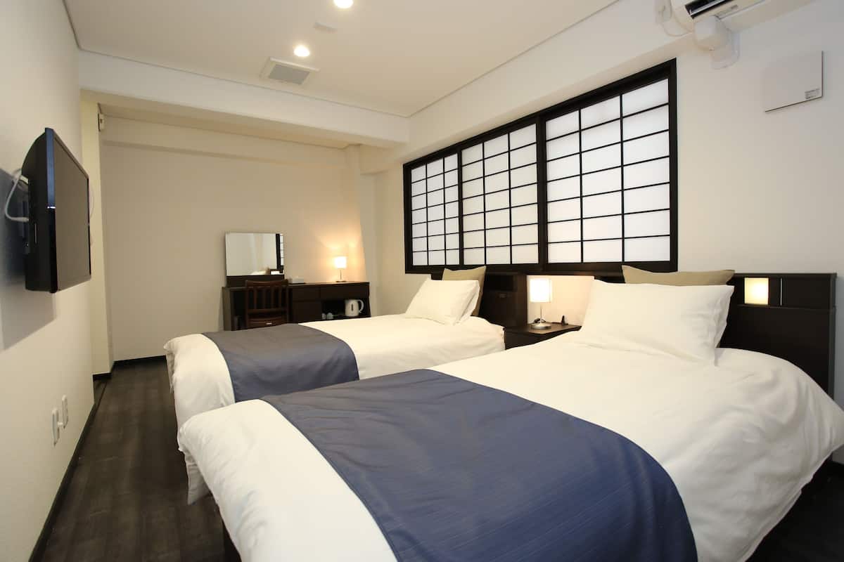 Standard Twin Room | In-room safe, blackout drapes, cribs (free), WiFi (free)