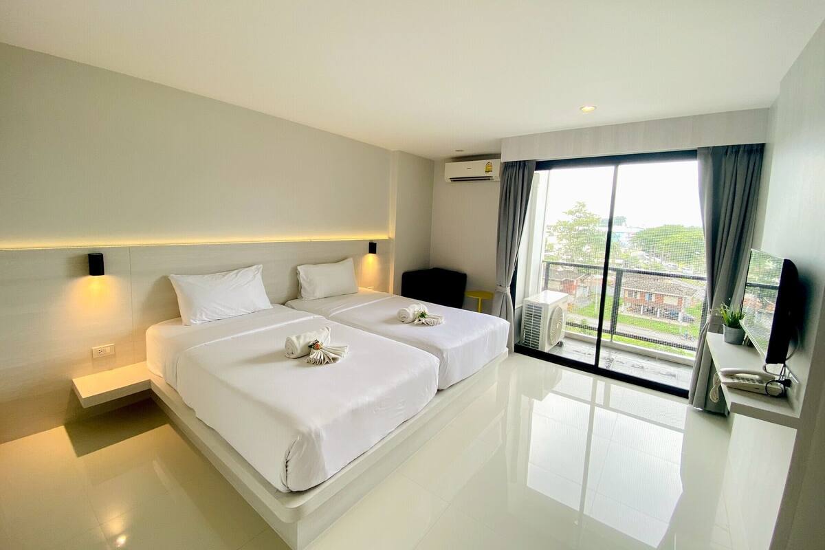 Standardværelse med 2 enkeltsenge | Minibar, mørklægningsgardiner, gratis Wi-Fi, sengetøj