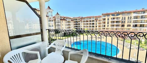 Deluxe Apartment, Pool View | Balcony view