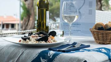 Lunch and dinner served, local cuisine