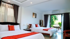 Family Room, Garden View | Minibar, desk, blackout drapes, soundproofing - Bi's House Homestay (Da Nang)