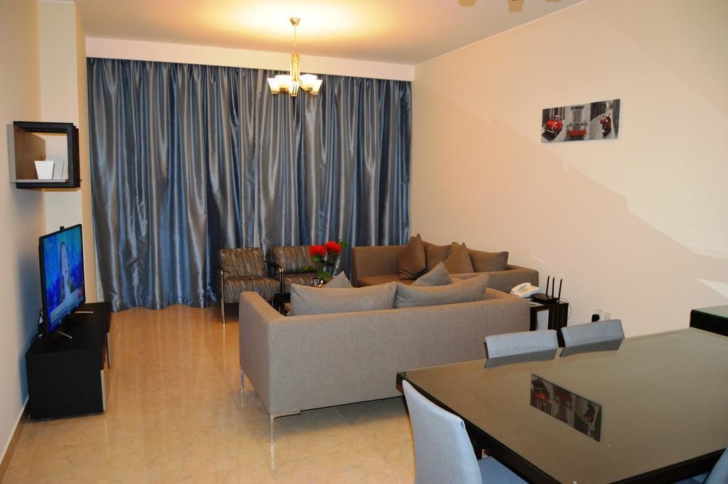 Apartment, 2 Bedrooms | Living area | Flat-screen TV