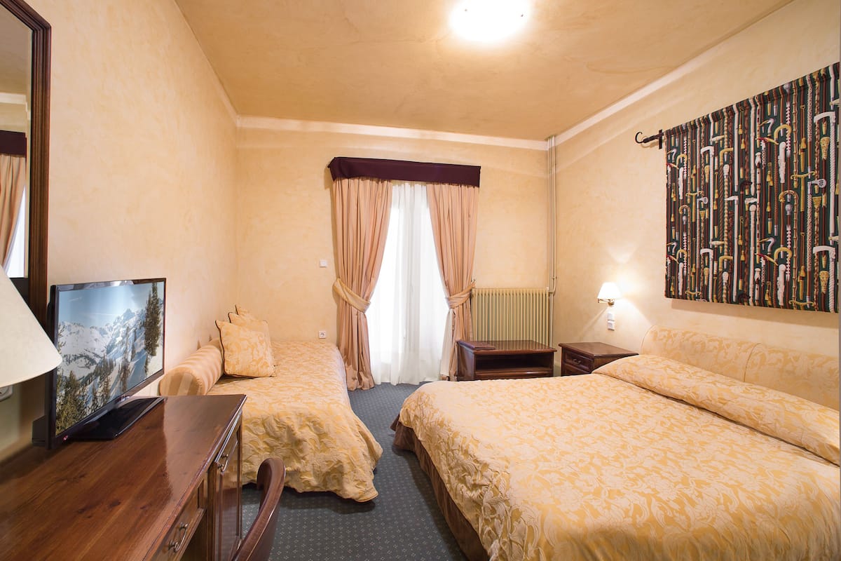 Chambre triple | 1 chambre, minibar, coffre-fort