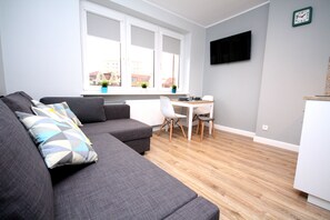 City Studio | Living area | Flat-screen TV