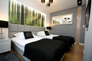 1 chambre, fer et planche à repasser, lits bébé (en supplément)