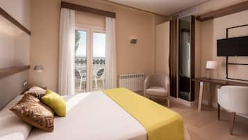 Ropa de cama de alta calidad, minibar, caja fuerte y escritorio