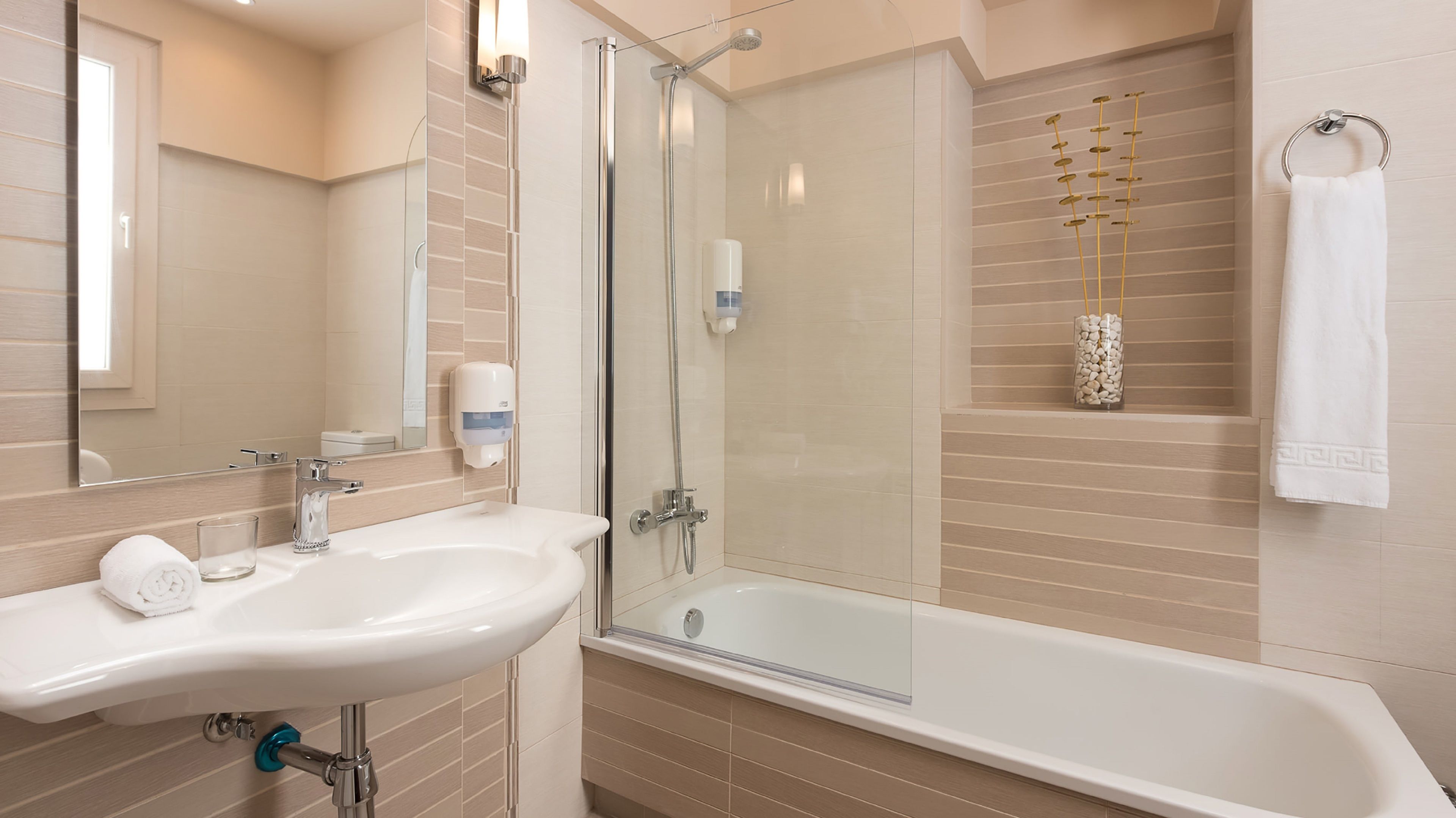 eco-friendly toiletries, hair dryer, bidet, towels