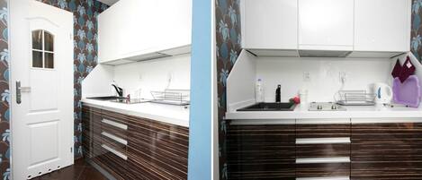 Fridge, stovetop, coffee/tea maker, electric kettle