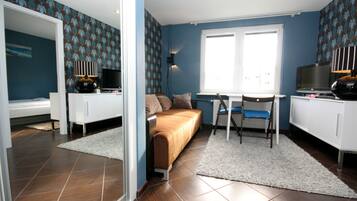 Suite, 1 Bedroom | Living area | Flat-screen TV