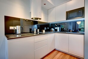 Comfort-Suite, 1 Schlafzimmer, Balkon, am Strand | Eigene Küche | Kühlschrank, Mikrowelle, Geschirrspüler