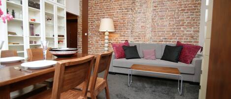 Suíte estúdio urbana | Sala de estar | TV de tela plana