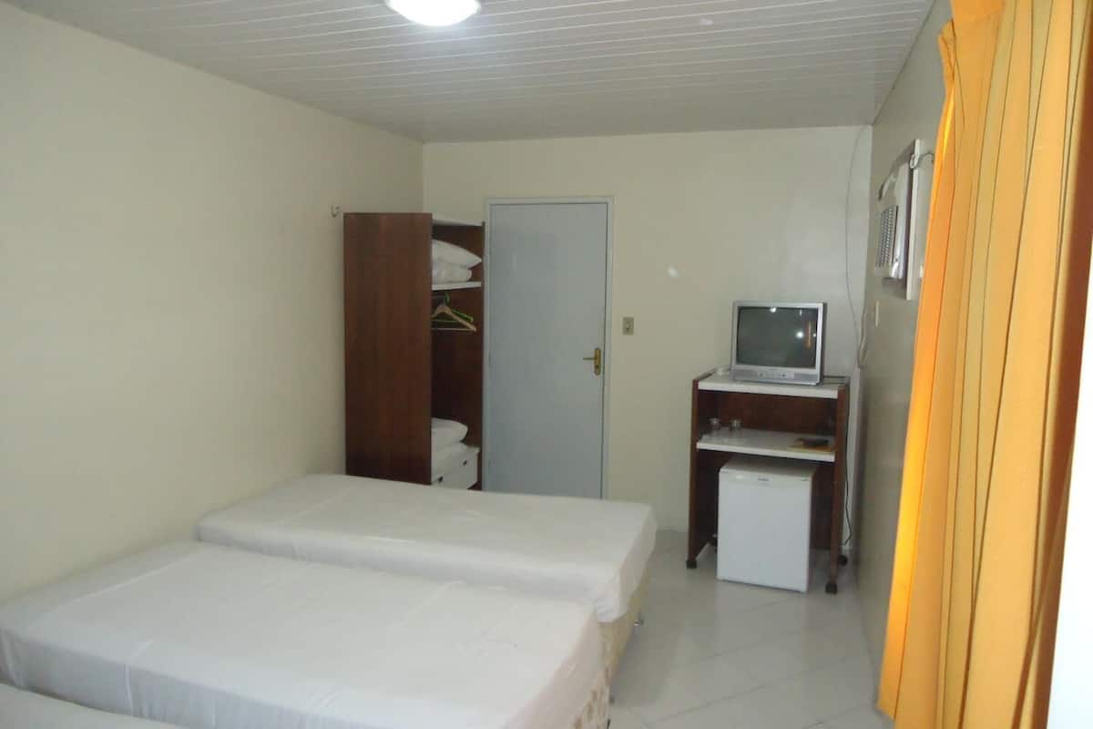 luxury single room | minibar, desk, blackout curtains, iron/ironing board