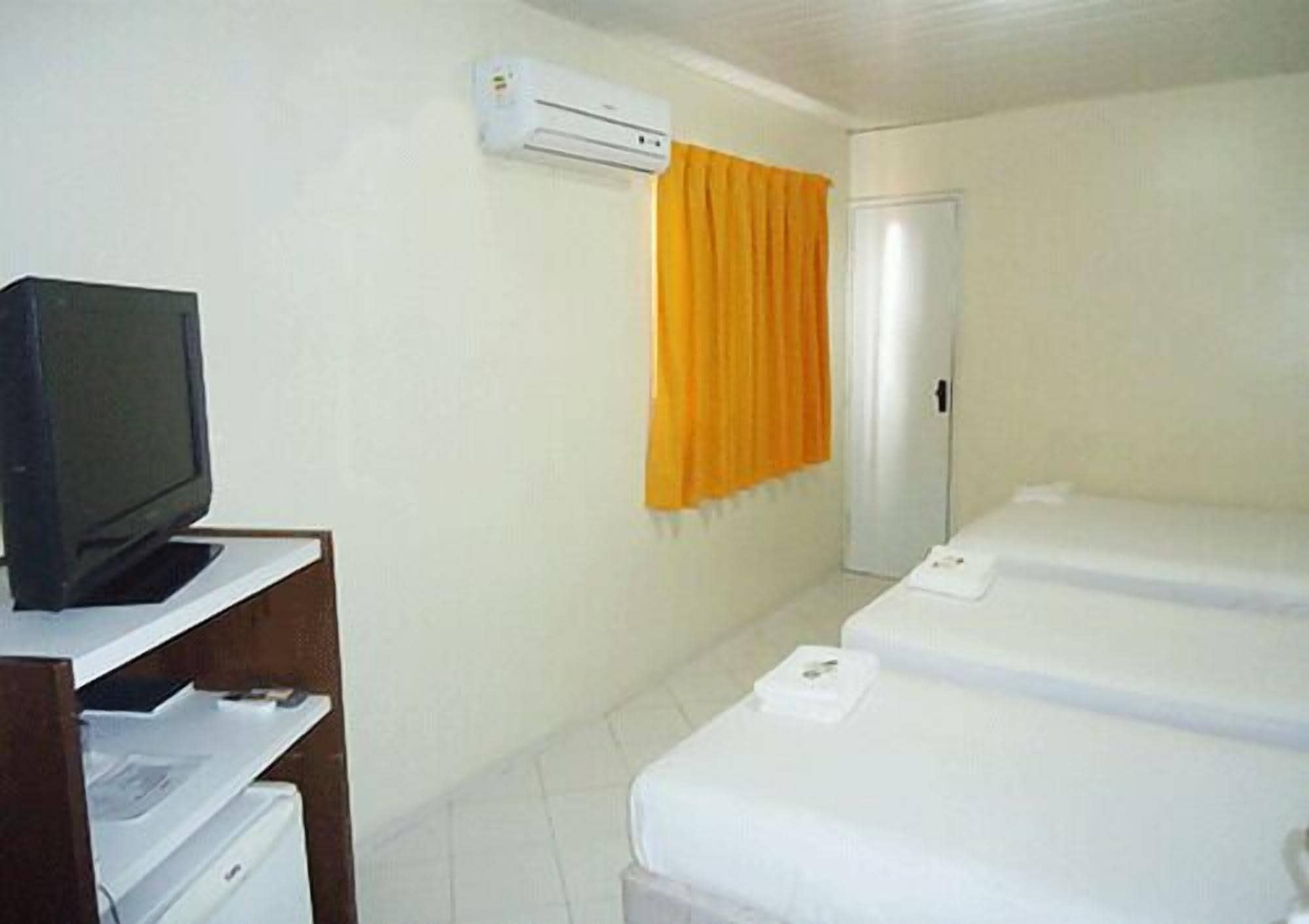 minibar, desk, blackout curtains, iron/ironing board