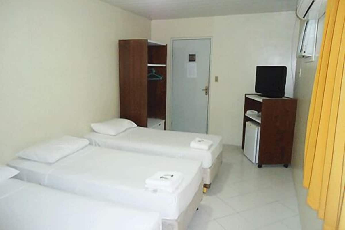 minibar, desk, blackout curtains, iron/ironing board