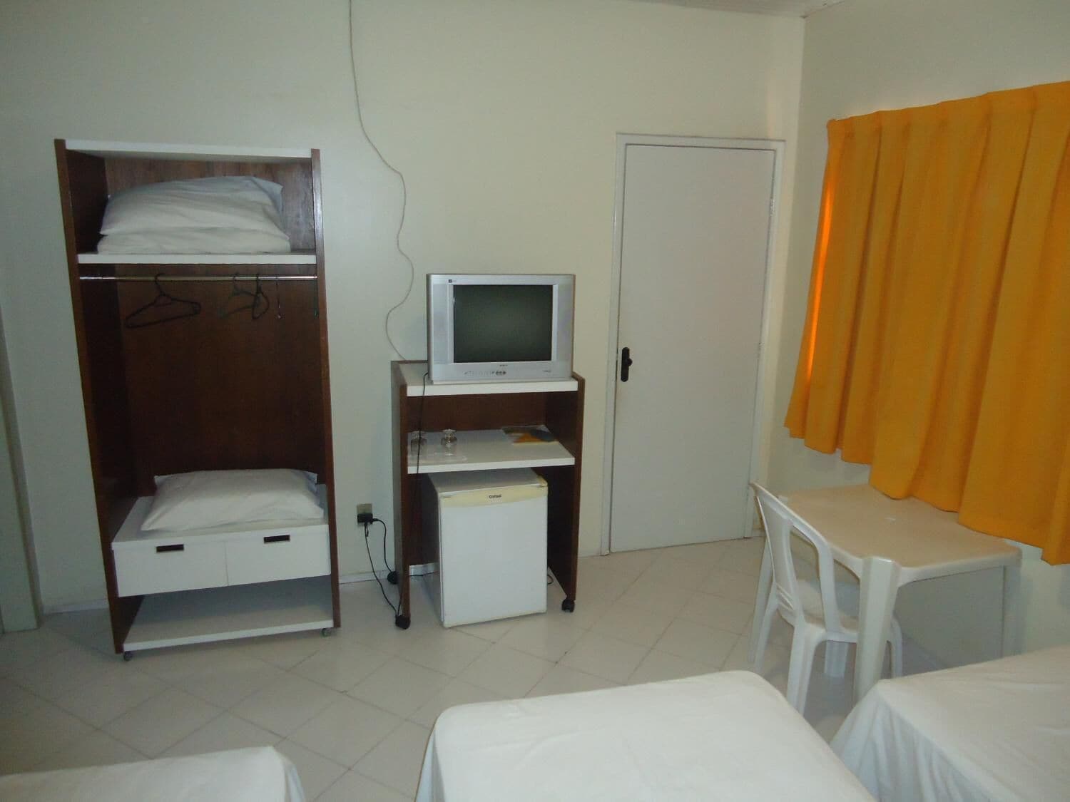 minibar, desk, blackout curtains, iron/ironing board